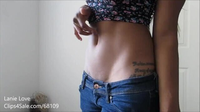 Cute black girl being teasy with belly