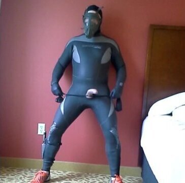 frogman wearing orange adidas soccer cleats jerks hotel room