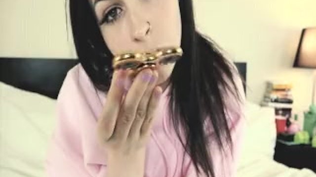 plays with fidget spinner