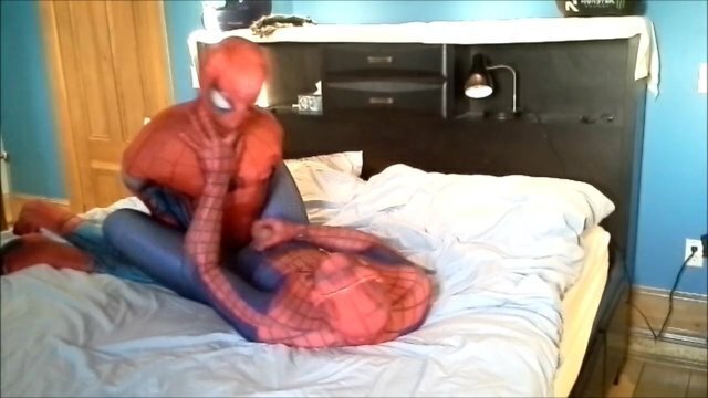 spiderman plays with dummy spiderman