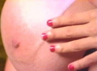 Busty Nicole Reed plays with her big boobs 