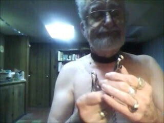 tommy demonstrates nipple clamps - then he cums