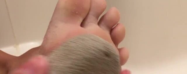 Teen Scrubs Feet With Foot Rock Lotions