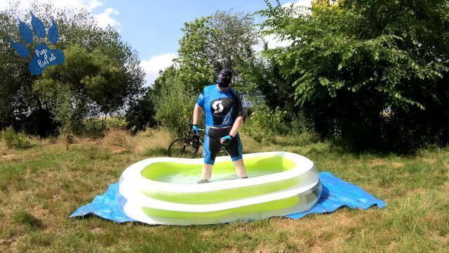Cyclist pool cooling down pawing