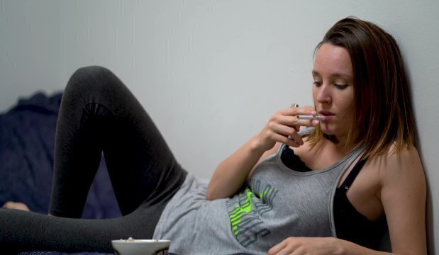 Young Brunette Smoking