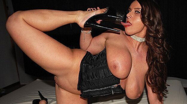 busty flexible milf toying with glow dildo