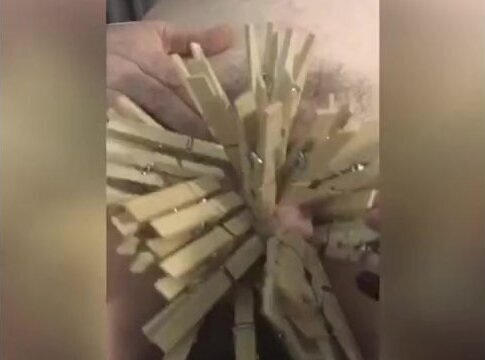 Femdom uses clothespins to torture slaves Cock and Balls