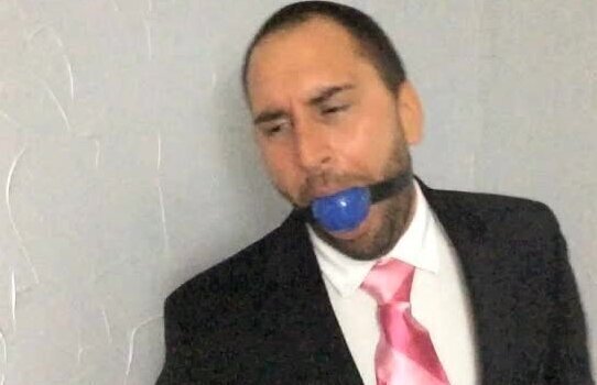 Handcuffed Ballgagged and Suit Stripped