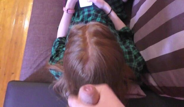 Cum on the stepsister's red hair while she watched instagram