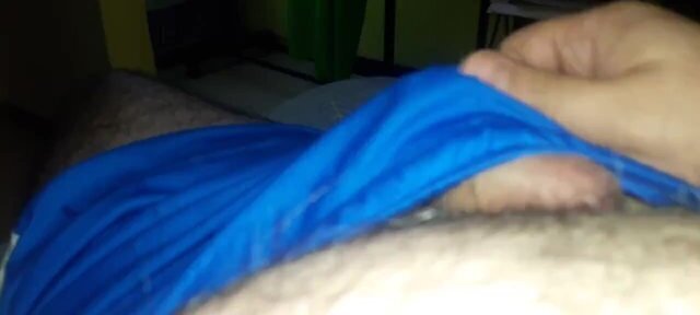 Masturbating in  bed.