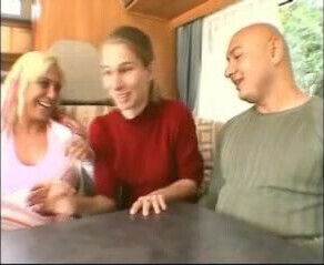 German mature couple with their campervan