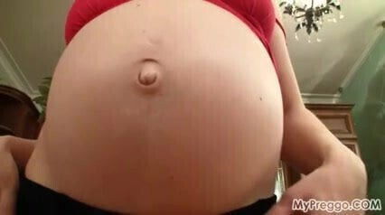 Pregnant teen Heating Kitchen