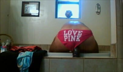 Jaxpantyguy with his pink panties and purple dildo