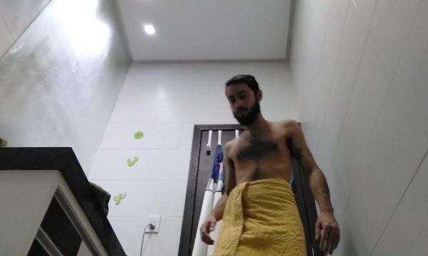 DRYING HIMSELF BATHROOM