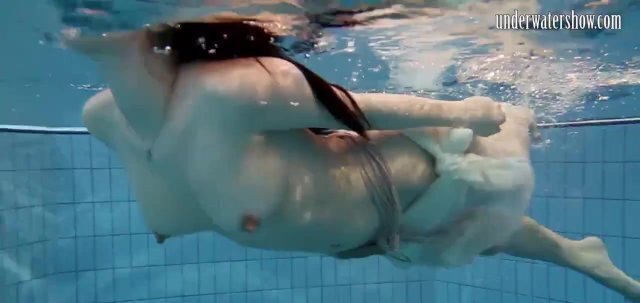 Dark haired teen Andrea pool