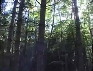 French girl with 2 men in forest
