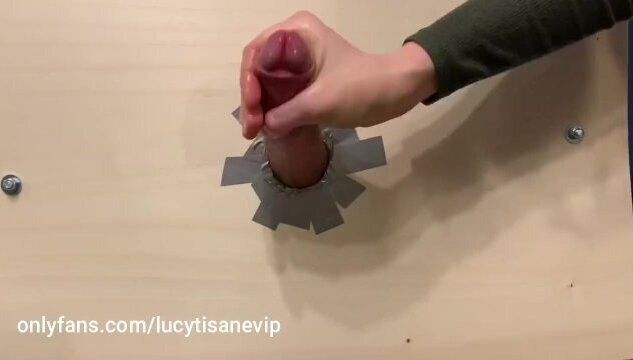 Penis milked through a gloryhole by Lucy Tisane