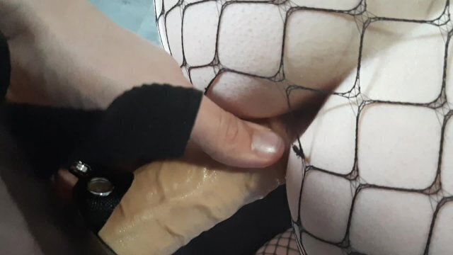 Dirty talking mistress lets slave fuck with strapon