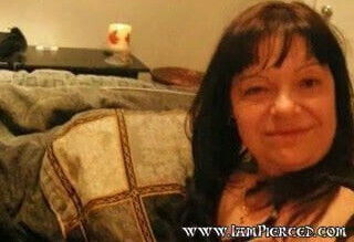 Pierced slave with nipple pussy rings foot fucking