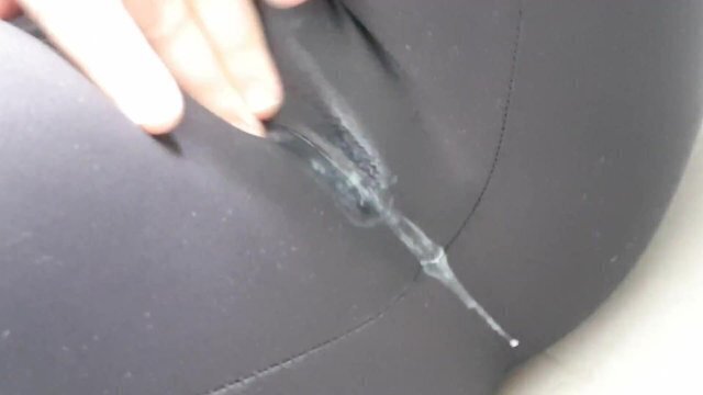 Creamy pussy squirts through tights