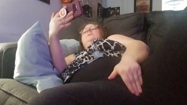 Watching porn phone masturbaiting through pants