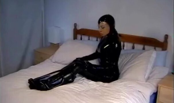 Cute girl black latex catsuit with mask makes self bondage rubber vacuum sleepbag part