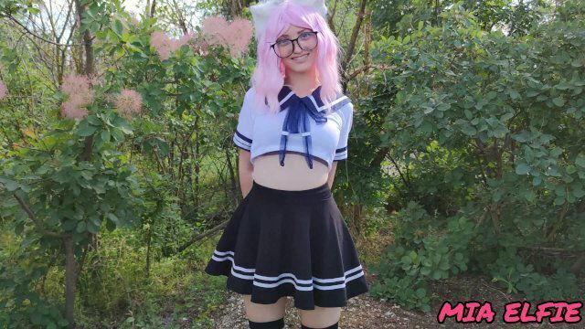 Sexy schoolgirl with ears uniform walks down abandoned road