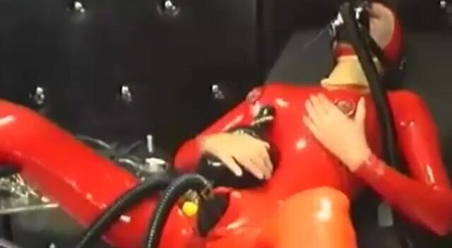 girl full encased rubber suit enjoys mask breathplay black room