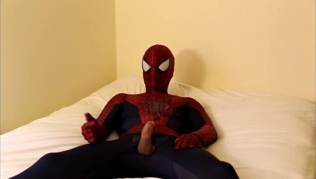 spiderman jerks cums over suit