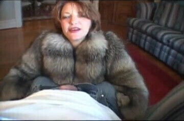 Blow in fox fur coat