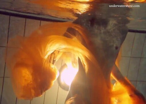 Blonde super tight teen Nastya underwater