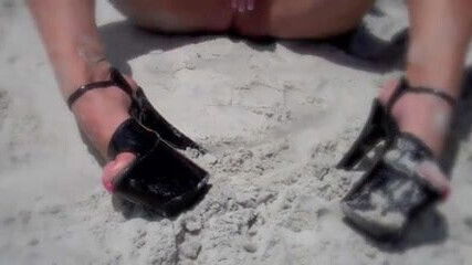 Milf blonde on beach RUBS HER PUSSY