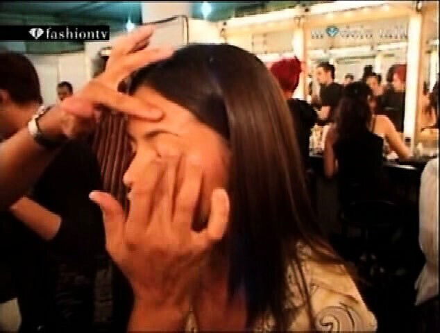 Adriana Lima walking down runway couple sexy