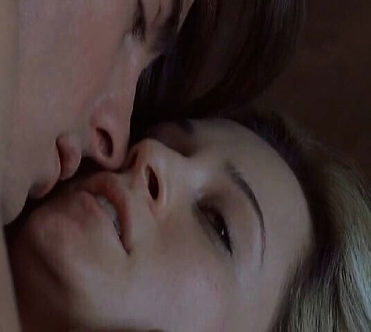 Camille Sullivan topless stands front mirror