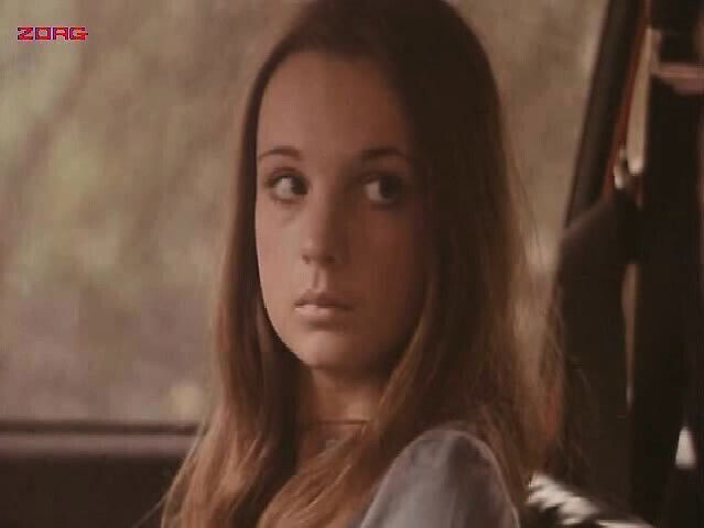 Christina Lindberg having pull shirt