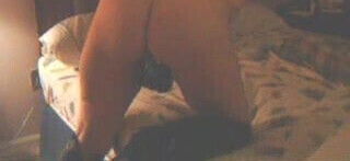 Mrs. Commish in her black boots