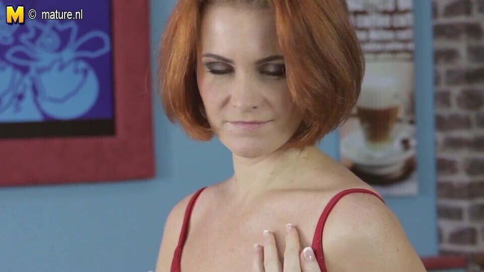redhead MILF playing with pussy