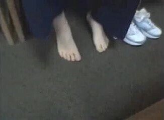 Sexy MILF shows natural feet