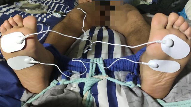 Male feet Torture feet electric soles