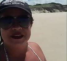 Me exibindo na praia