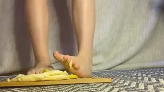 Crushing banana between toes
