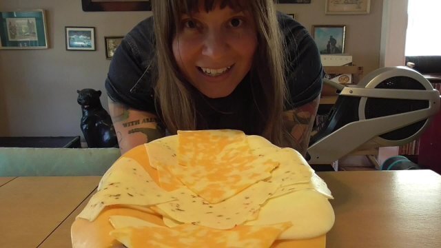 WISCONSIN NEIGHBOR DOMINATES WITH CHEESE SLICES