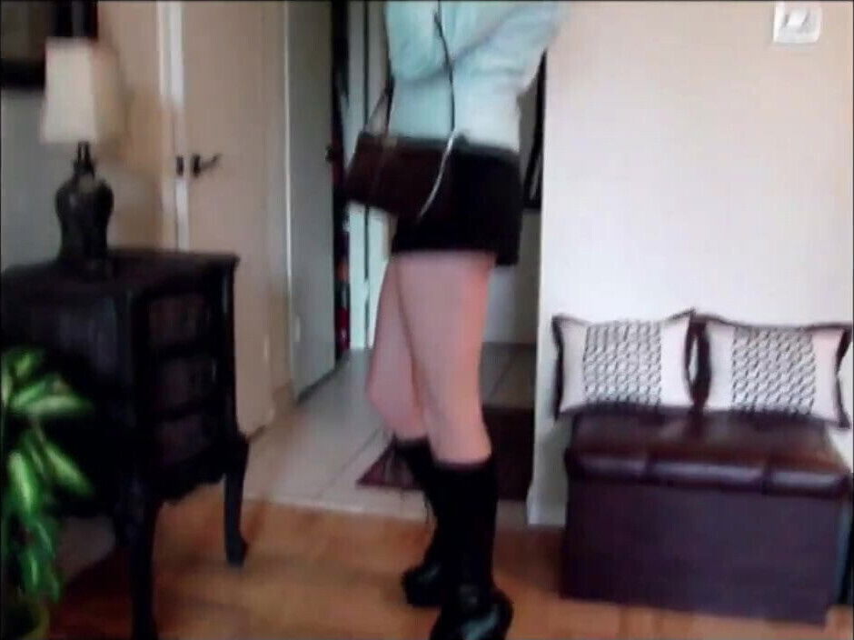 Zipping up and wearing Black Knee High Boots