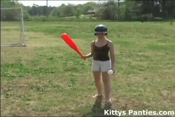 Innocent teen Kitty playing softball outdoors