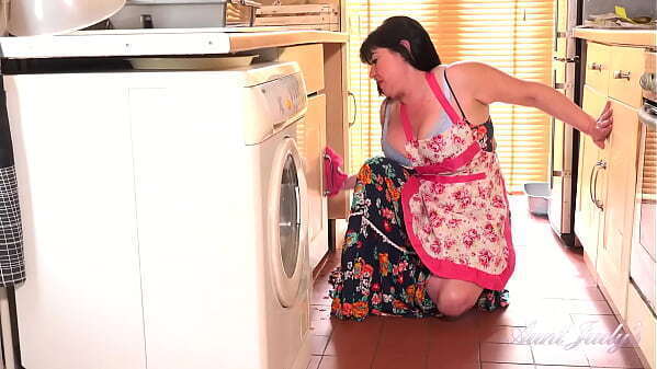 AuntJudys Busty Full-Bush Janey gets horny cleaning kitchen