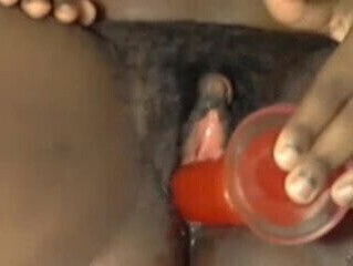 Hairy pussy black girl, large clit squirts playing with vibe