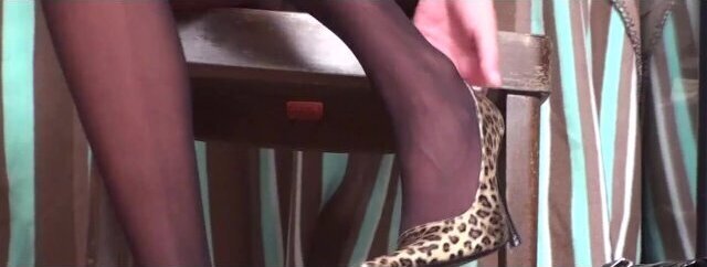 Alissa tries some shoes through going from large shoe collection.