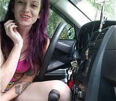 Exhibitionist babe spreads legs wide masturbating in public car park