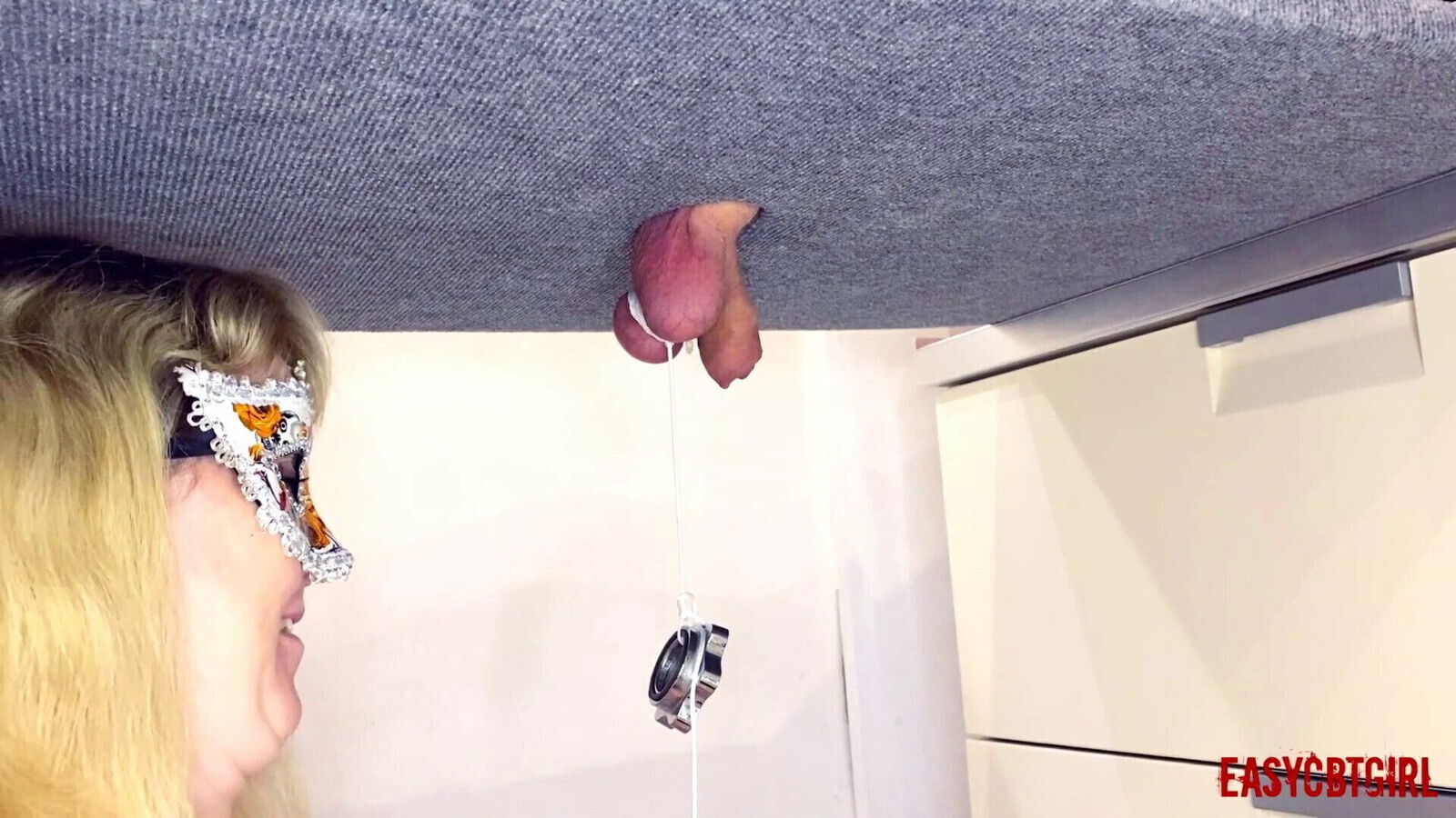 Mistress ties heavy objects balls milking table