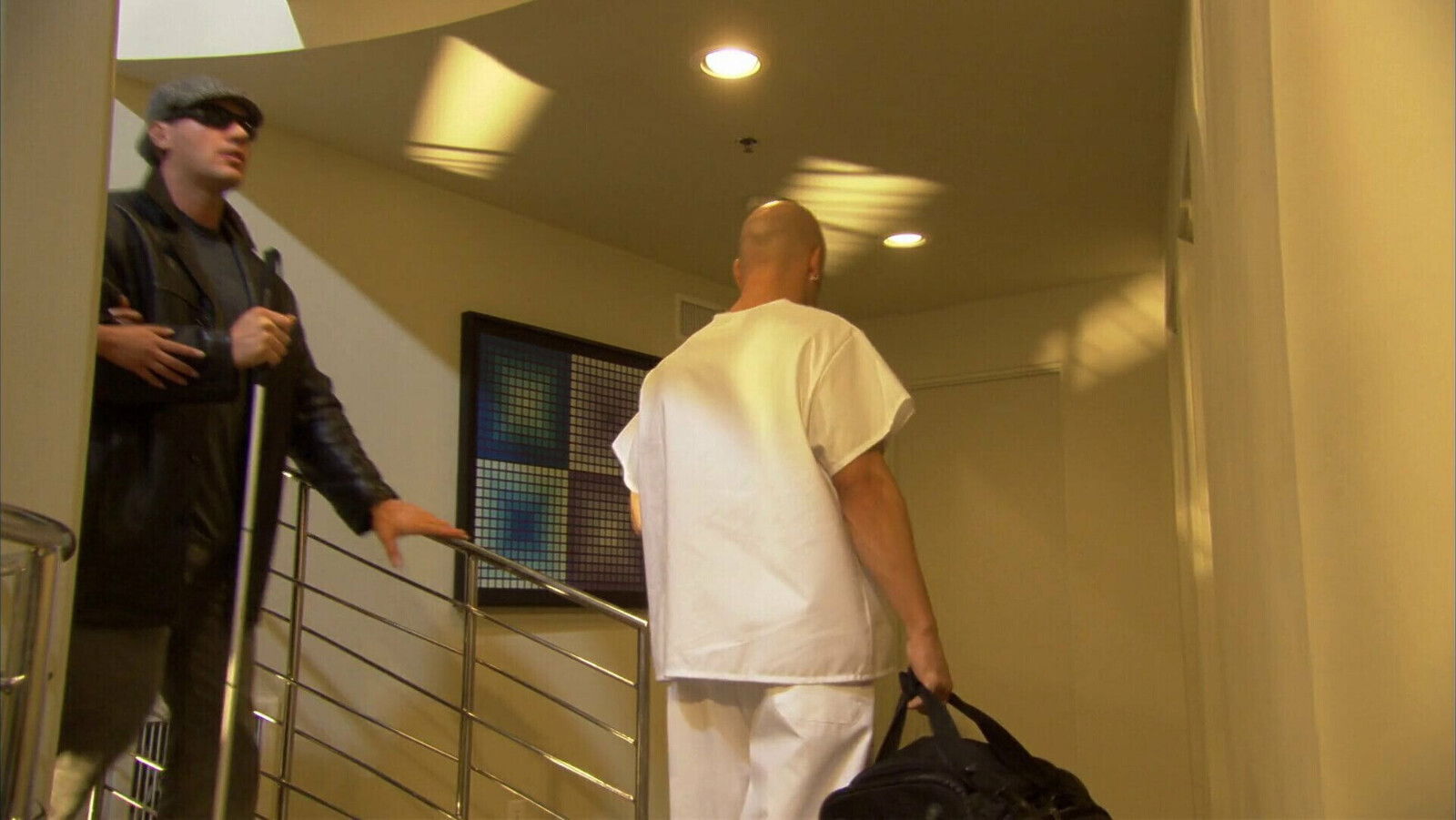 Tattooed brunette moans while getting banged hard